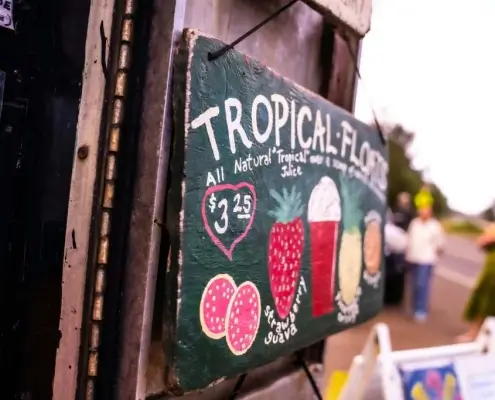 Sign for Hawaii business selling flowers. Using Local SEO in Hawaii they can increase foot traffic to their store.